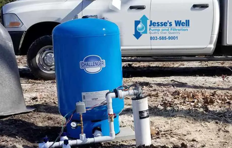Technician servicing residential well pump system in Columbia SC